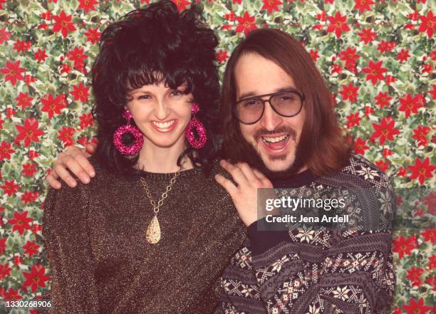 retro 1980s couple at holiday party, funny parents celebrating - stort hår bildbanksfoton och bilder