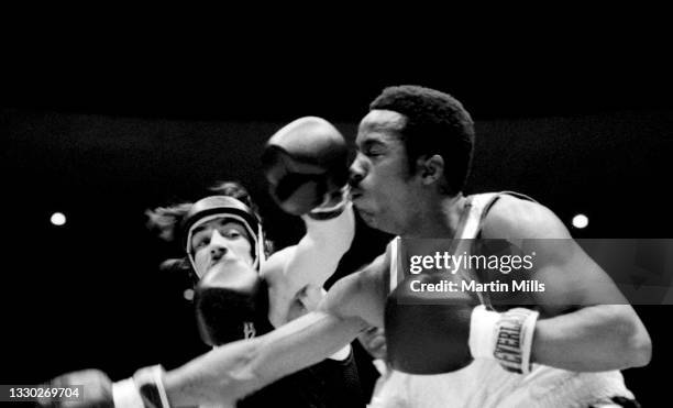 Amateur boxer Gary Griffin of the United States punches amateur boxer Bobby Lee Hunter of the United States during their light flyweight match on...