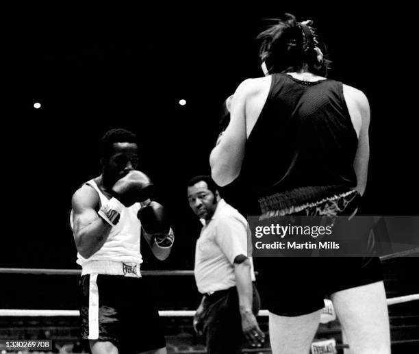 Amateur boxer Bobby Lee Hunter of the United States fights amateur boxer Gary Griffin of the United States during their light flyweight match on...