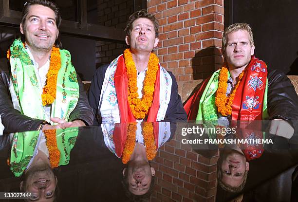 Danish rock band Michael Learns to Rock, known as MLTR, Mikkel Lentz , Jascha Richter , and Kare Wancher speak with the press after they arrived at...