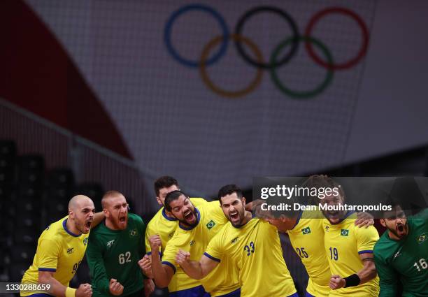 Team Brazil are seen cheering after the national anthem ahead of the Men's Preliminary Round Group A between Norway and Brazil on day one of the...