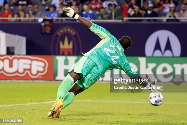 Bill Hamid of D.C. United attempts to save the ball in the game against the Chicago Fire at Soldier Field on July 21, 2021 in Chicago, Illinois.