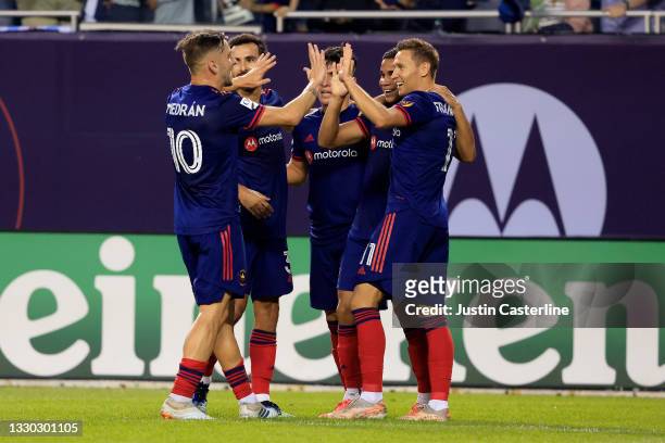 The Chicago Fire celebrate a goal in the game against the D.C. United at Soldier Field on July 21, 2021 in Chicago, Illinois.