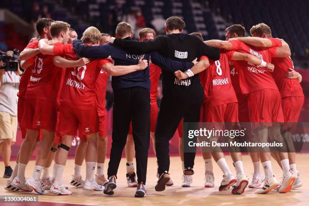 Team Norway players huddle after winning the Men's Preliminary Round Group A between Norway and Brazil on day one of the Tokyo 2020 Olympic Games at...