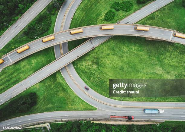 aerial view of school buses - aerial surveillance stock pictures, royalty-free photos & images