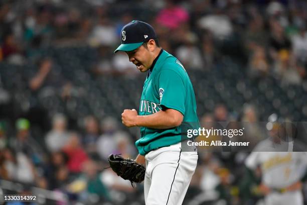 Yusei Kikuchi of the Seattle Mariners reacts after striking out the batter to end the sixth inning during the game against the Oakland Athletics at...