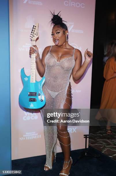 Megan Thee Stallion attends Sports Illustrated Swimsuit 2021 Issue Cover Reveal Party at Seminole Hard Rock Hotel & Casino on July 23, 2021 in...