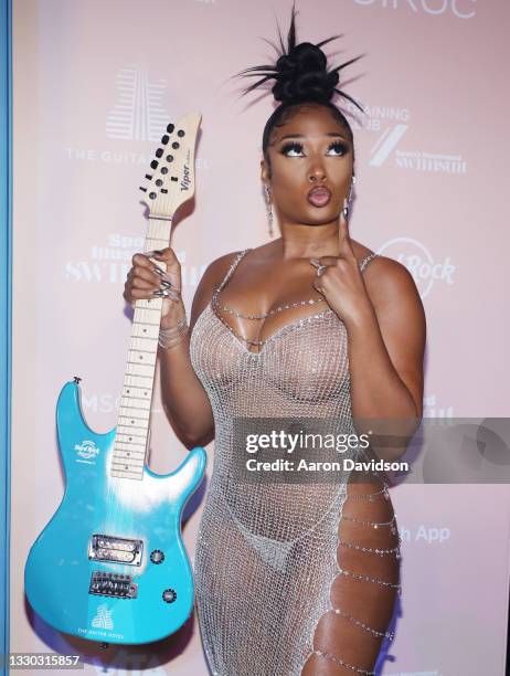 Megan Thee Stallion attends Sports Illustrated Swimsuit 2021 Issue Cover Reveal Party at Seminole Hard Rock Hotel & Casino on July 23, 2021 in...