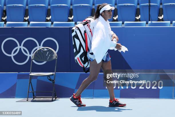 Heather Watson of Team Great Britain walks off court after losing her Women's Singles First Round match against Anna-Lena Friedsam of Team Germany on...