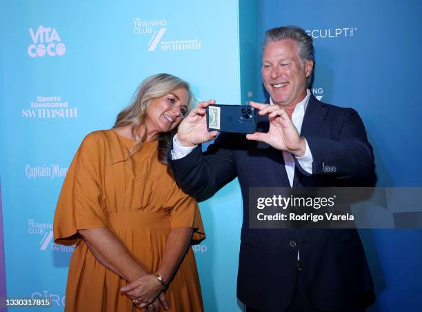 Day and Ross Levinsohn attend the Sports Illustrated Swimsuit celebration of the launch of the 2021 Issue at Seminole Hard Rock Hotel & Casino on...