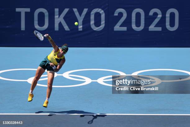 Samantha Stosur of Team Australia serves during her Women's Singles First Round match against Elena Rybakina of Team Kazakhstan on day one of the...