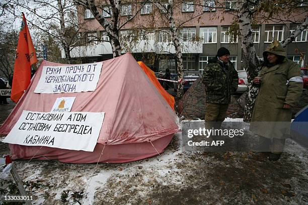 Liquidators of the Chernobyl nuclear power station 1986's accident stand near a tent during a protest for better social treatment in the eastern...