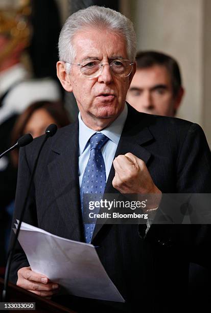 Mario Monti, Italy's prime minister designate, gestures during a news conference to announce the names of the cabinet ministers that will form...