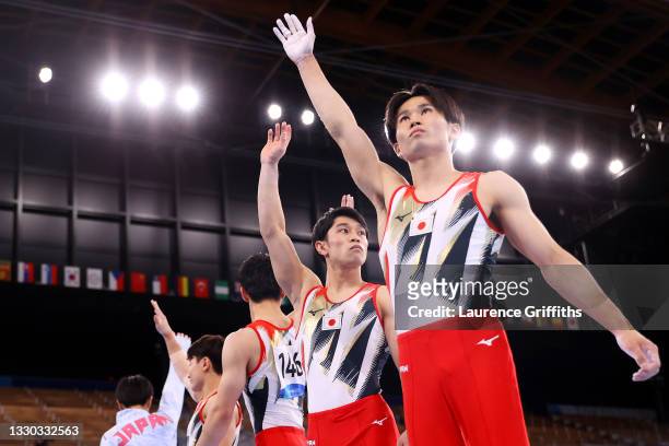 Team Japan looks on during Men's Qualification on day one of the Tokyo 2020 Olympic Games at Ariake Gymnastics Centre on July 24, 2021 in Tokyo,...