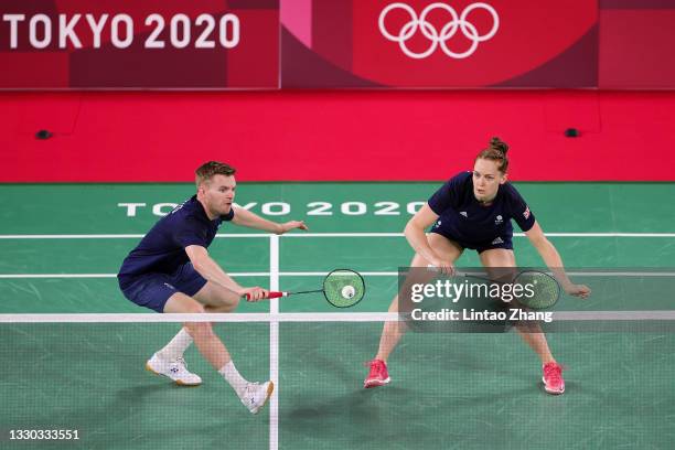 Ellis Marcus and Lauren Smith of Team Great Britain compete against Thom Gicquel and Delphine Delrue of Team France during a Mix Doubles Group B...