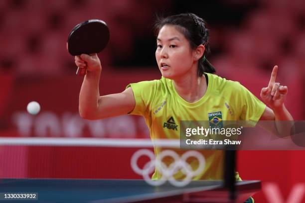 Jessica Yamada of Team Brazil in action during her Women's Singles Preliminary Round match on day one of the Tokyo 2020 Olympic Games at Tokyo...