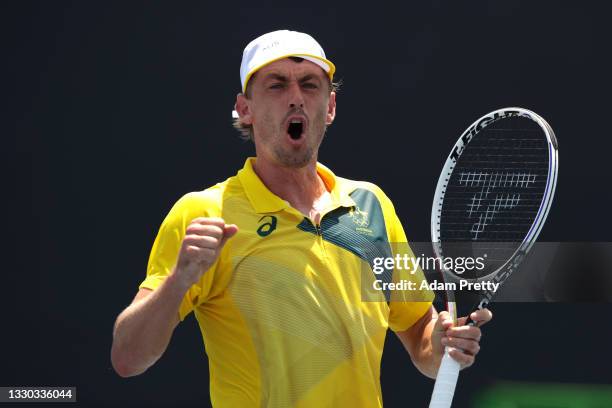 John Millman of Team Australia celebrates after a point during his Men's Singles First Round match against Lorenzo Musetti of Team Italy on day one...