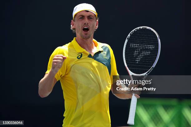 John Millman of Team Australia celebrates after a point during his Men's Singles First Round match against Lorenzo Musetti of Team Italy on day one...