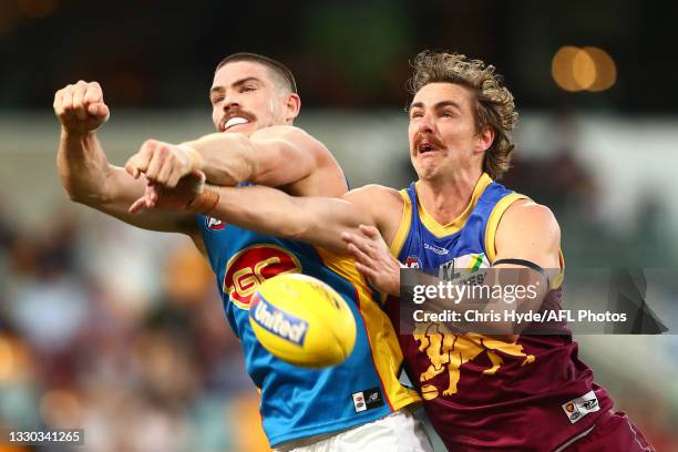 Joe Daniher of the Lions and Sam Collins of the Suns compete for the ball during the round 20 AFL match between Brisbane Lions and Gold Coast Suns at...
