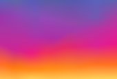 Abstract blurred gradient bright mesh banner background texture.Blue violet purple pink red orange yellow colors.