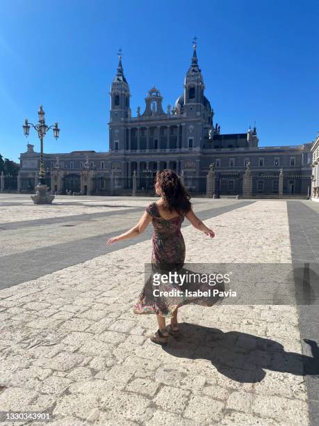 young hispanic woman at madrid royal palace, spain - madrid spain stock pictures, royalty-free photos & images