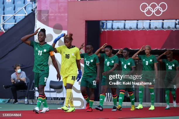 Babra Banda of Team Zambia leads their side out prior to the Women's First Round Group F match between China and Zambia on day one of the Tokyo 2020...