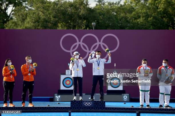 Silver medalists Gabriela Schloesser and Steve Wijler of Team Netherlands, gold medalists San An and Je Deok Kim of Team South Korea, and bronze...