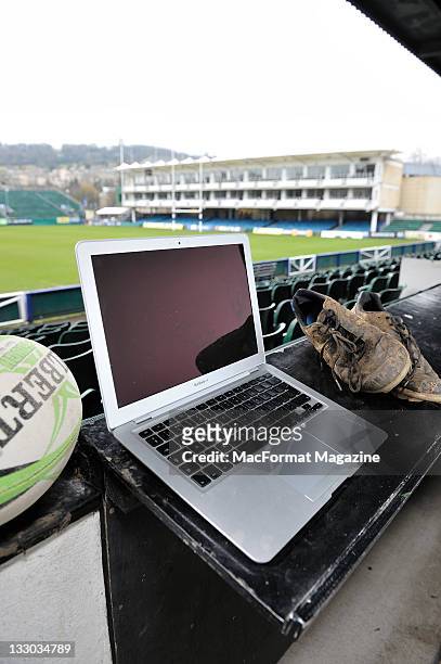 An Apple Macbook Pro with a rugby ball and muddy rugby boots, session for MacFormat Magazine/Future via Getty Images taken on February 10, 2011.