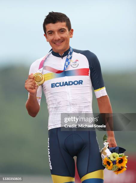 Richard Carapaz of Team Ecuador poses with the gold medal after the Men's road race at the Fuji International Speedway on day one of the Tokyo 2020...