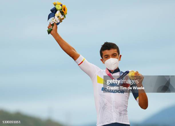 Richard Carapaz of Team Ecuador poses with the gold medal after the Men's road race at the Fuji International Speedway on day one of the Tokyo 2020...