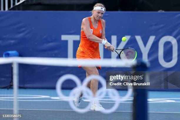 Kiki Bertens of Team Netherlands plays a backhand during her Women's Singles First Round match against Marketa Vondrousova of Team Czech Republic on...