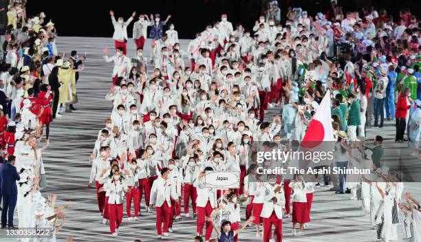 Team Japan enters the stadium during the Opening Ceremony of the Tokyo 2020 Olympic Games at Olympic Stadium on July 23, 2021 in Tokyo, Japan.