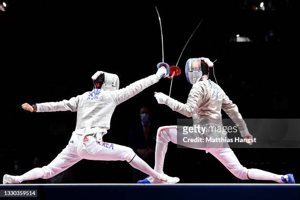 Luigi Samele of Italy loses his sabre as he competes against and Junghwan Kim of Korea in the men’s sabre individual semi final 2of the fencing on...