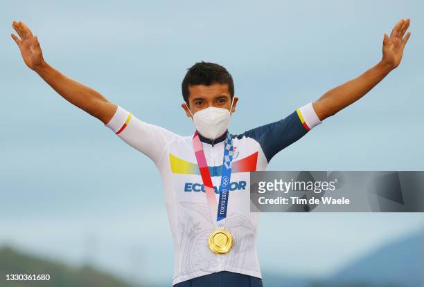 Richard Carapaz of Team Ecuador poses with the gold medal after the Men's road race at the Fuji International Speedway on day one of the Tokyo 2020...