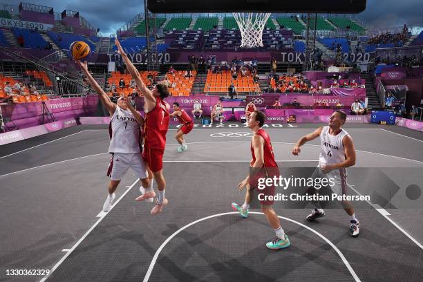 Nauris Miezis of Team Latvia drives to the basket during the Men's Pool Round match between Latvia and Belgium on day one of the Tokyo 2020 Olympic...