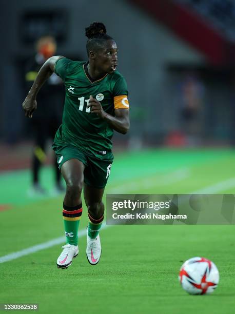 Babra Banda of Team Zambia runs with the ball during the Women's First Round Group F match between China and Zambia on day one of the Tokyo 2020...