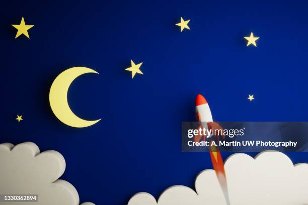 children's illustration. 3d render of a space rocket in a starry sky. - 3d rocket stockfoto's en -beelden