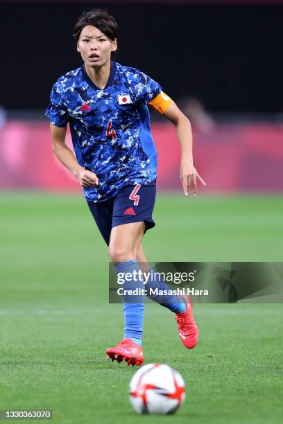 Saki Kumagai of Team Japan looks on during the Women's First Round Group E match between Japan and Great Britain on day one of the Tokyo 2020 Olympic...