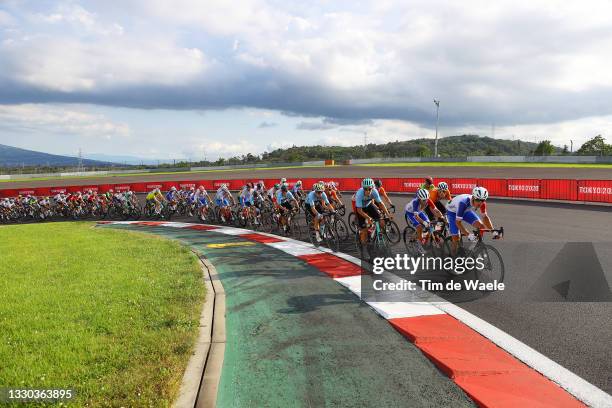 General view of Benoit Cosnefroy of Team France and the peloton passing through Fuji International Speedway circuit during the Men's road race on day...
