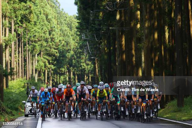Mauri Vansevenant of Team Belgium & Jan Tratnik of Team Slovenia leads the peloton passes through a forest during the Men's road race at the Fuji...