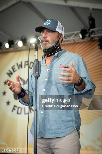 Festival Producer Jay Sweet introduces a band during day one of the 2021 Newport Folk Festival at Fort Adams State Park on July 23, 2021 in Newport,...