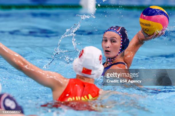 Zewen Deng of China, Elvina Karimova of ROC during the Tokyo 2020 Olympic Waterpolo Tournament Women match between China and ROC at Tatsumi Waterpolo...