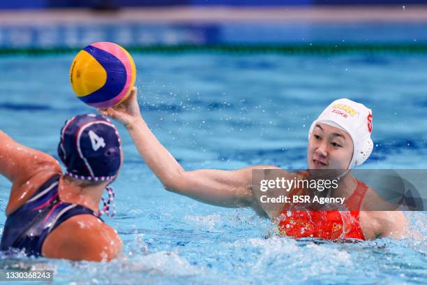 Guannan Niu of China, Elvina Karimova of ROC during the Tokyo 2020 Olympic Waterpolo Tournament Women match between China and ROC at Tatsumi...