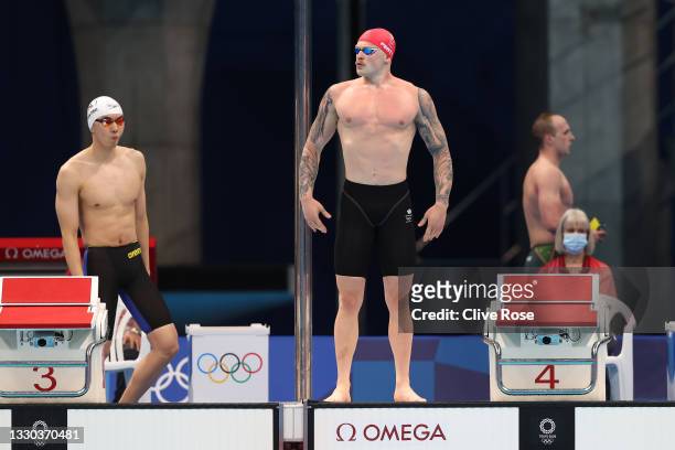 Adam Peaty of Team Great Britain competes in heat seven of the Men's 100m Breaststroke on day one of the Tokyo 2020 Olympic Games at Tokyo Aquatics...