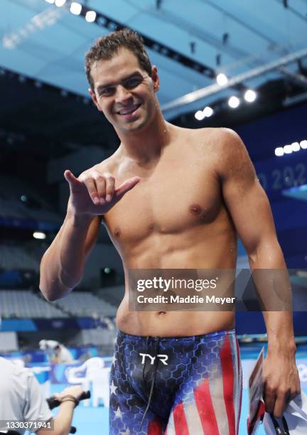 Michael Andrew of Team United States reacts after competing in heat five of the Men's 100m Breaststroke on day one of the Tokyo 2020 Olympic Games at...