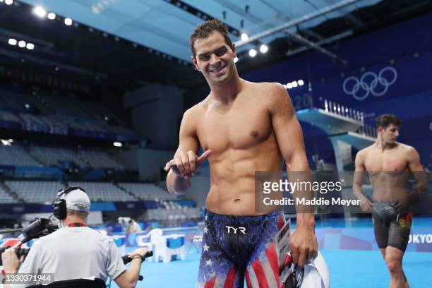 Michael Andrew of Team United States reacts after competing in heat five of the Men's 100m Breaststroke on day one of the Tokyo 2020 Olympic Games at...