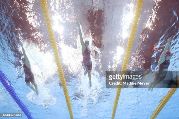 Catie Deloof of Team United States competes in heat one of the Women's 4 x 100m Freestyle Relay on day one of the Tokyo 2020 Olympic Games at Tokyo...
