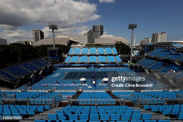 General view of court one as Aslan Karatsev of Team ROC plays Tommy Paul of Team USA in their Men's Singles First Round match on day one of the Tokyo...