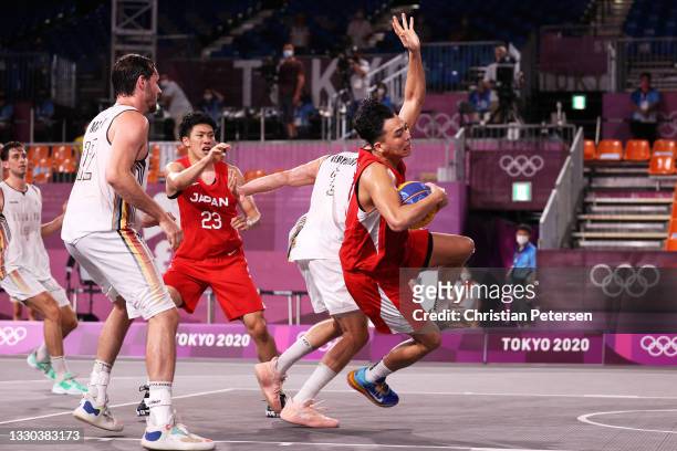 Tomoya Ochiai of Team Japan is fouled during the Men's Pool Round match between Belgium and Japan on day one of the Tokyo 2020 Olympic Games at Aomi...