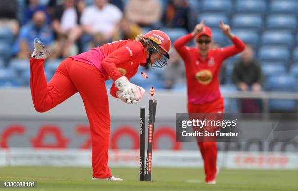 Welsh fire keeper Sarah Taylor runs out Superchargers batter Laura Wolvaardt during The Hundred match between Northern Superchargers Women and Welsh...